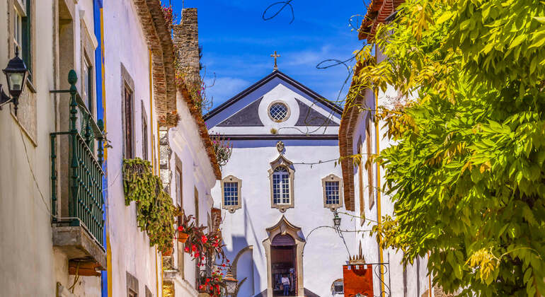 App di audioguida: Passeggiata nella città di Obidos