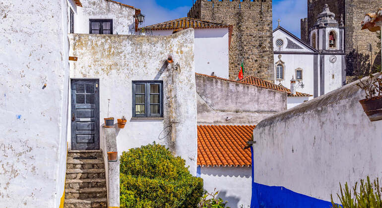 App di audioguida: Passeggiata nella città di Obidos