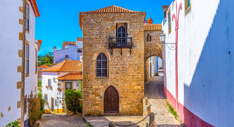 App di audioguida: Passeggiata nella città di Obidos
