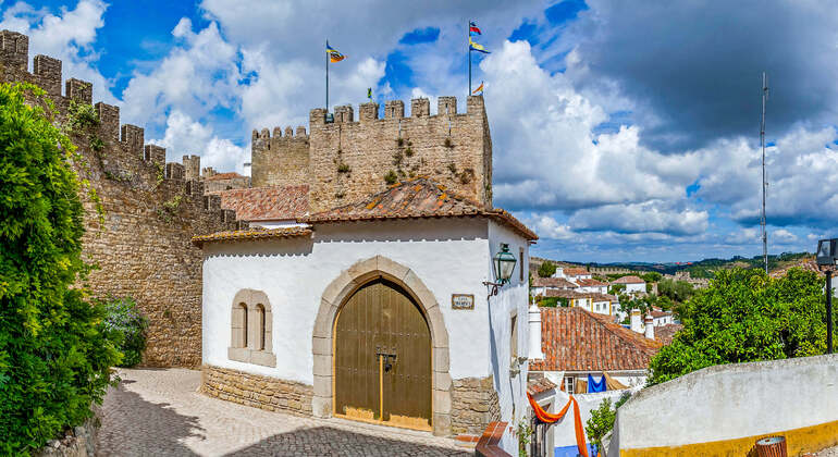 App di audioguida: Passeggiata nella città di Obidos