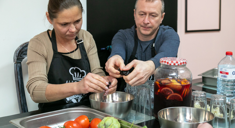 Clase de paella y sangría con tapas y visita al mercado