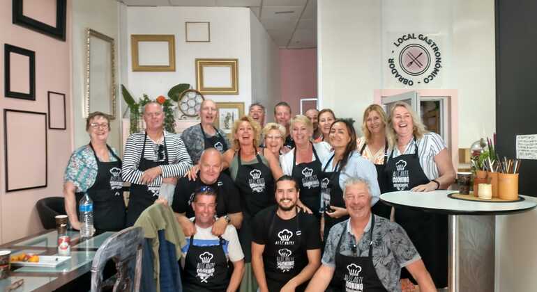 Clase de paella y sangría con tapas y visita al mercado